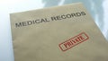 Medical records private, seal stamped on folder with important documents, health