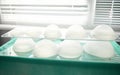 Breast silicone implants of various sizes and shapes for breast augmentation and aesthetic plastic surgery after breast resection Royalty Free Stock Photo