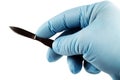 medical scalpel in the hand of a surgeon