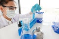 Medical scientists have experimented with liquid chemicals in vitro to analyze viral data in chemical laboratories. Scientific Royalty Free Stock Photo