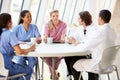 Medical Staff Chatting In Modern Hospital Canteen