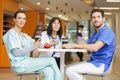 medical staff chatting in modern hospital canteen Royalty Free Stock Photo