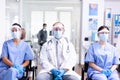 Medical staff in clinic waiting area