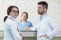 Medical Staff Having Discussion In Modern Hospital Corridor Royalty Free Stock Photo