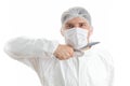 Medical staff member threatens with a knife in his hand; isolated on white background