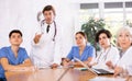 Medical staff during morning briefing in boardroom of clinic Royalty Free Stock Photo