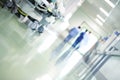 Medical staff walking down the hospital hallway Royalty Free Stock Photo