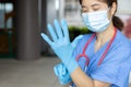 Medical staff wearing gloves to prepare for the outbreak of communicable diseases Corona Virus COVID-19