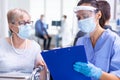 Medical staff wearing visor Royalty Free Stock Photo