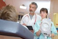 Medical staffs conducting interview to patient