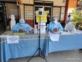 Medical staffs with full protective gears at corona virus swab center.