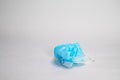 Medical sterile disposable masks. Crumpled used medical mask lies on a white background