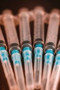 Medical Sterile Syringes Needles, Close up Syringes on wooden Background, Health care concept.