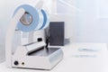 Medical sterilization packaging machine and roll pack for sterilized dental instruments. Royalty Free Stock Photo