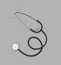 Medical stethoscope on a gray background Royalty Free Stock Photo