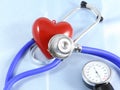 Medical stethoscope head and red toy heart lying on cardiogram chart closeup. help, prophylaxis, disease prevention or insurance Royalty Free Stock Photo