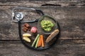 Medical stethoscope making a loop around a healthy vegan snack