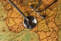 Medical stethoscope over africa healthcheck. close-up map Royalty Free Stock Photo