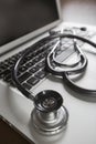 Medical Stethoscope Resting on Laptop Computer Royalty Free Stock Photo