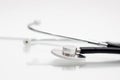 Medical stethoscope on white background. Close-up of phonendoscope. Doctor`s tool. Selective focus Royalty Free Stock Photo