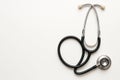 Medical stethoscope on a white background. Space for text. Royalty Free Stock Photo