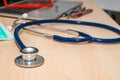 Medical still life with keyboard on wooden table