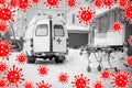 Medical stretcher near to ambulance with open doors on the street surrounded by images of coronavirus covid-19. dangerous