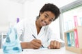 medical student writing notes for research Royalty Free Stock Photo