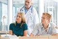 Medical students with professor in classroom Royalty Free Stock Photo