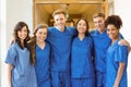 Medical students smiling at the camera Royalty Free Stock Photo
