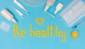 Medical supplies for prevention and against viral diseases.Inscription Be healthy made of pills. Medical flat lay close up,top