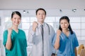 Medical surgeon team of young people looking at camera with determination and confidence in the hospital Royalty Free Stock Photo