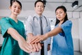 Medical surgeon team of young people looking at camera with determination and confidence in the hospital, teamwork concept in Royalty Free Stock Photo