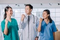 Medical surgeon team of young people looking at camera with determination and confidence in the hospital, teamwork concept in Royalty Free Stock Photo