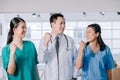 Medical surgeon team of young people looking at camera with determination and confidence in the hospital Royalty Free Stock Photo