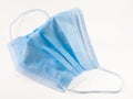 Medical surgical ear-loop blue mask isolated on white background. Corona virus protection concept. With clipping path Royalty Free Stock Photo