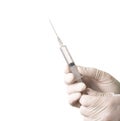 Medical syringe in hands Royalty Free Stock Photo