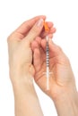 Medical syringe with insulin in hand Royalty Free Stock Photo