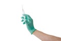 Medical syringe in a male hand wearing a medical glove