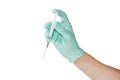 Medical syringe in a male hand wearing a medical glove