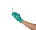 Medical syringe in a male hand wearing a medical glove