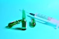 Medical syringe with a needle with injection. The concept of emergency care for patients with acute pain.