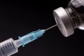 Medical syringe with the needle in the vial Royalty Free Stock Photo