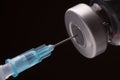 Medical syringe with the needle in the vial Royalty Free Stock Photo