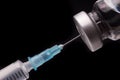 Medical syringe with the needle in the vial Royalty Free Stock Photo