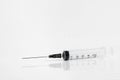 Medical syringe with reflection isolated on white background