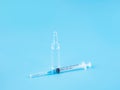 Medical syringe. Vertical ampoule with vaccine.