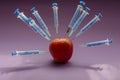 Medical syringes and an apple Royalty Free Stock Photo