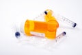 Medical syringes and plastic containers