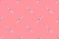 Medical syringes seamless pattern. Medical syringes on a colored background. Royalty Free Stock Photo
